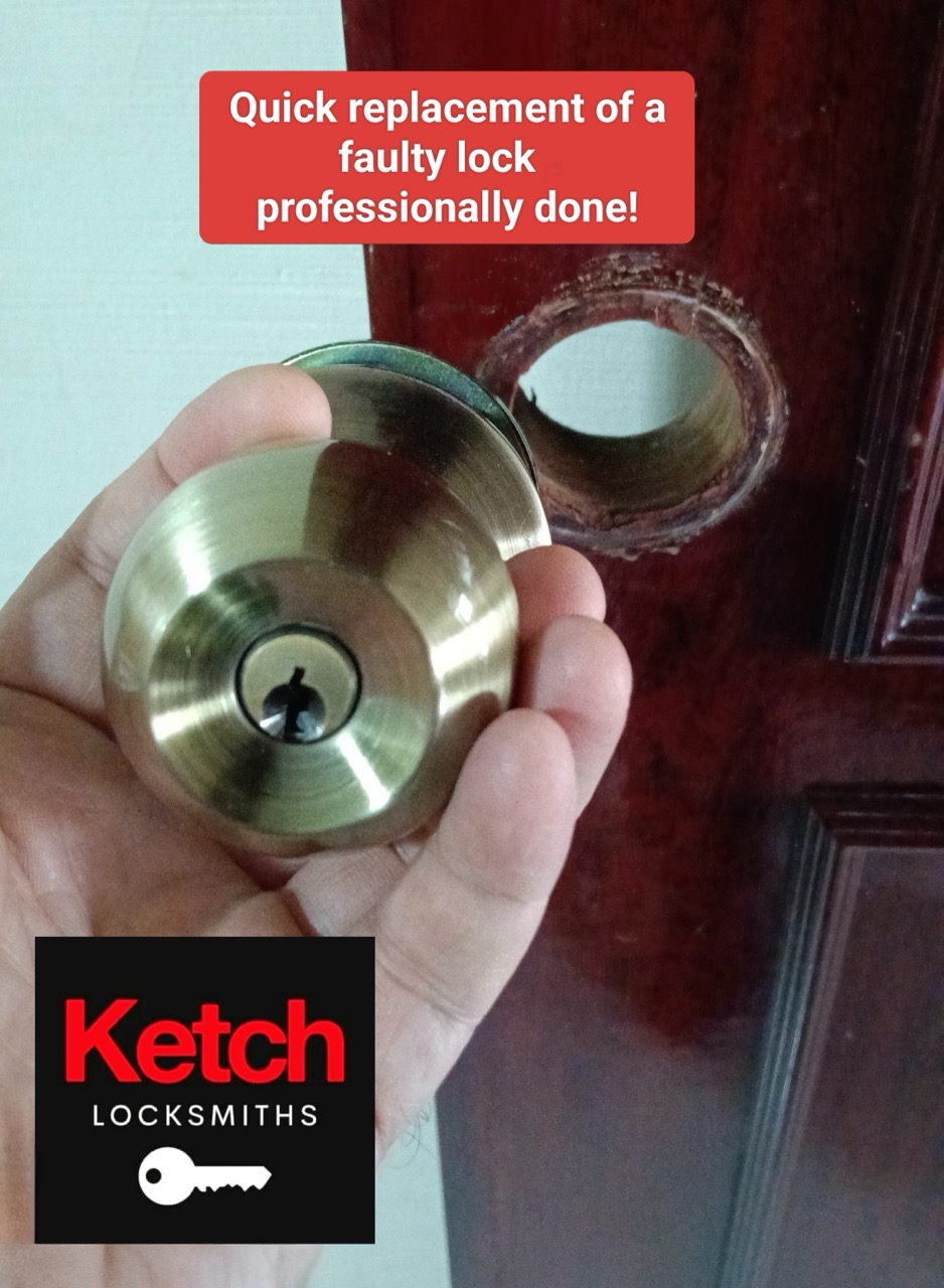 Brass door knob held in hand after a quick faulty-lock replacement.
